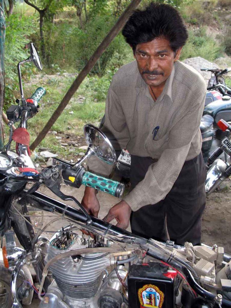 Mechanic-working-on-bike